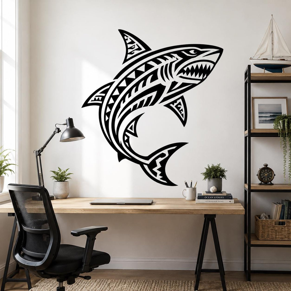 Black-and-white illustration of a curved shark with open jaws, sharp teeth, and bold geometric patterns across its body, fins, and tail on a white background.