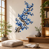 Tall blue floral branch wall decal with twisting brown trunk, cobalt and white blossoms and scattered blue buds.