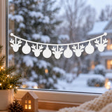 Christmas glass sticker showing alternating reindeer heads and hanging spherical ornaments