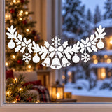 White Christmas window garland showing three bells under a bow and snowflake