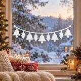 Christmas glass decoration with bell silhouettes and holly foliage in white vinyl