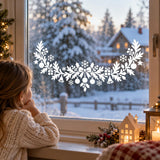 Festive white vinyl window decoration with botanical garland, ribbon, ornaments and bell silhouettes