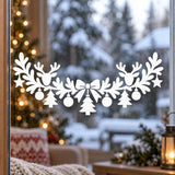 White Christmas window garland with two reindeer heads, a central bow, evergreen foliage, hanging ornaments, small trees and stars.