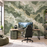Modern camouflage pattern with forest green shapes, pale details and geographic contour markings.