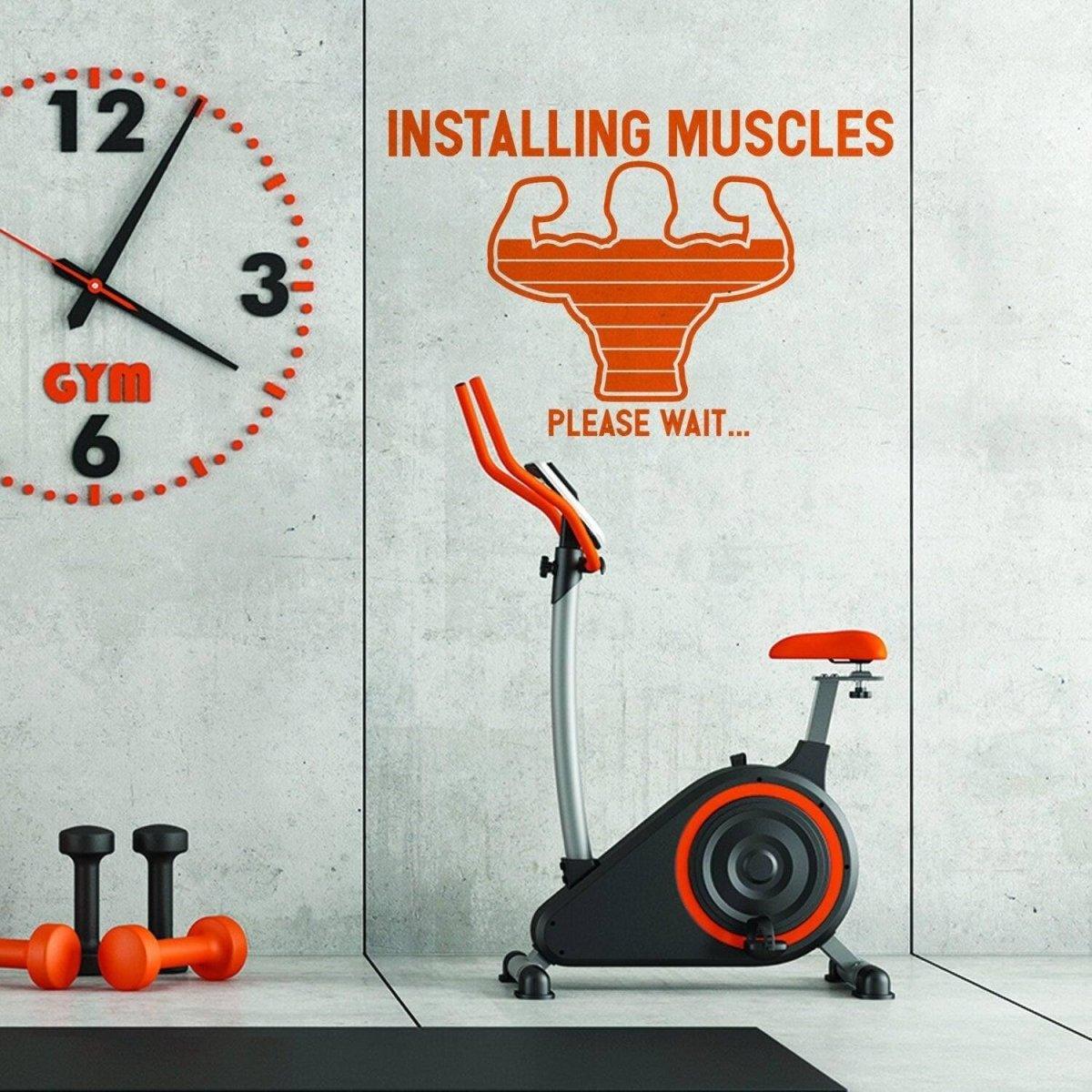 Наклейка Installing Muscles над велотренажёром