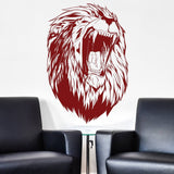 Roaring lion head wall sticker displayed above black chairs.