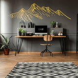 Mountain silhouette wall sticker decal above a modern desk setup in a stylish home office.