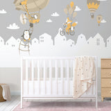WhimsyLand wall decals featuring penguins and foxes with hot air balloons.