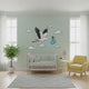 Stork delivering a baby boy nursery wall decal shown in a product video.