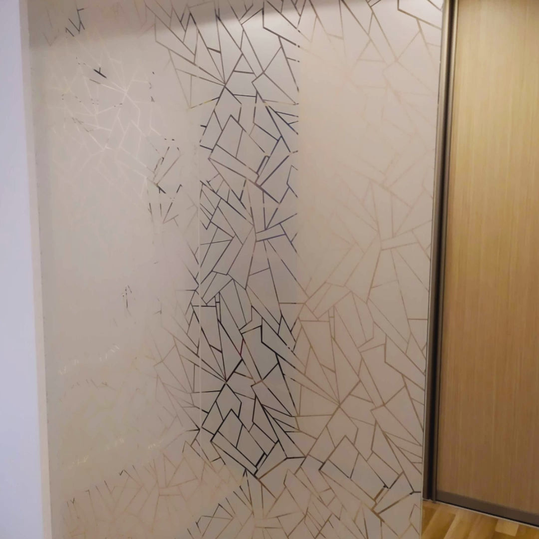 Geometric privacy glass decal shown on a window.