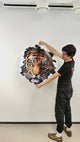3D tiger face wall decal shown in a product video.