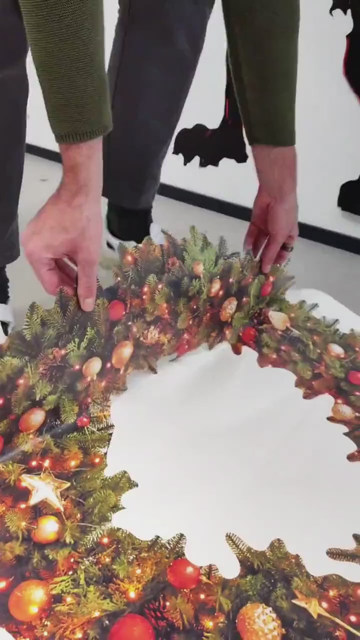 Christmas wreath wall decal shown in a product video.