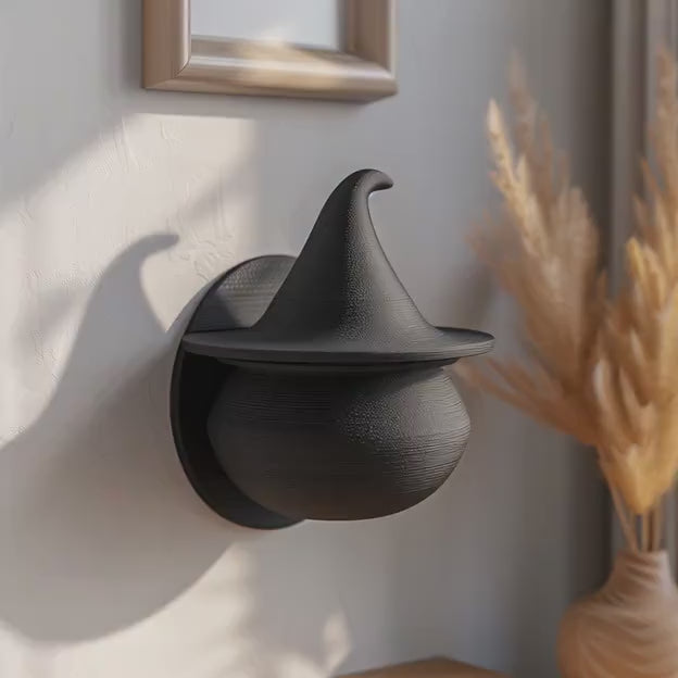 3D printed witch hat wall shelf shown in a product video.