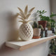 3D printed geometric pineapple memorial urn shown in a product video.