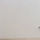 Decorated Christmas tree wall decal shown in a product video.