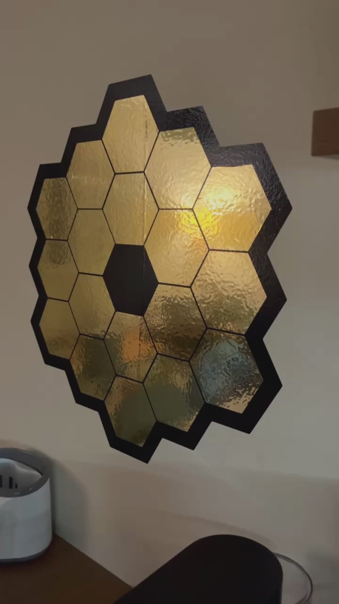 James Webb Space Telescope mirror wall sticker in gold chrome, perfect for astronomy-themed room decor.
