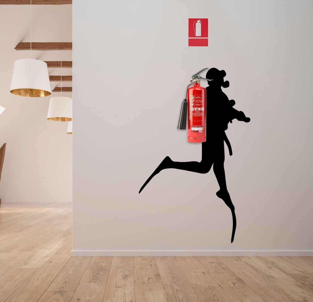 Silhouette wall decal of a figure carrying a fire extinguisher.