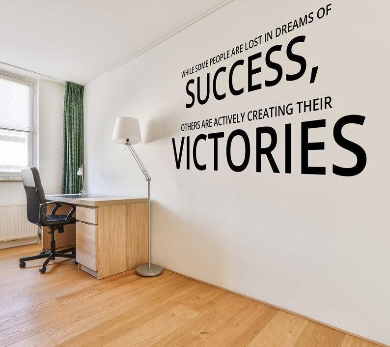 Inspirational wall decal with success quote in modern home office setting, motivating workspace decor.
