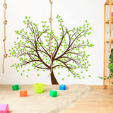 Nature's Serenity tree vinyl wall decal with green leaves.