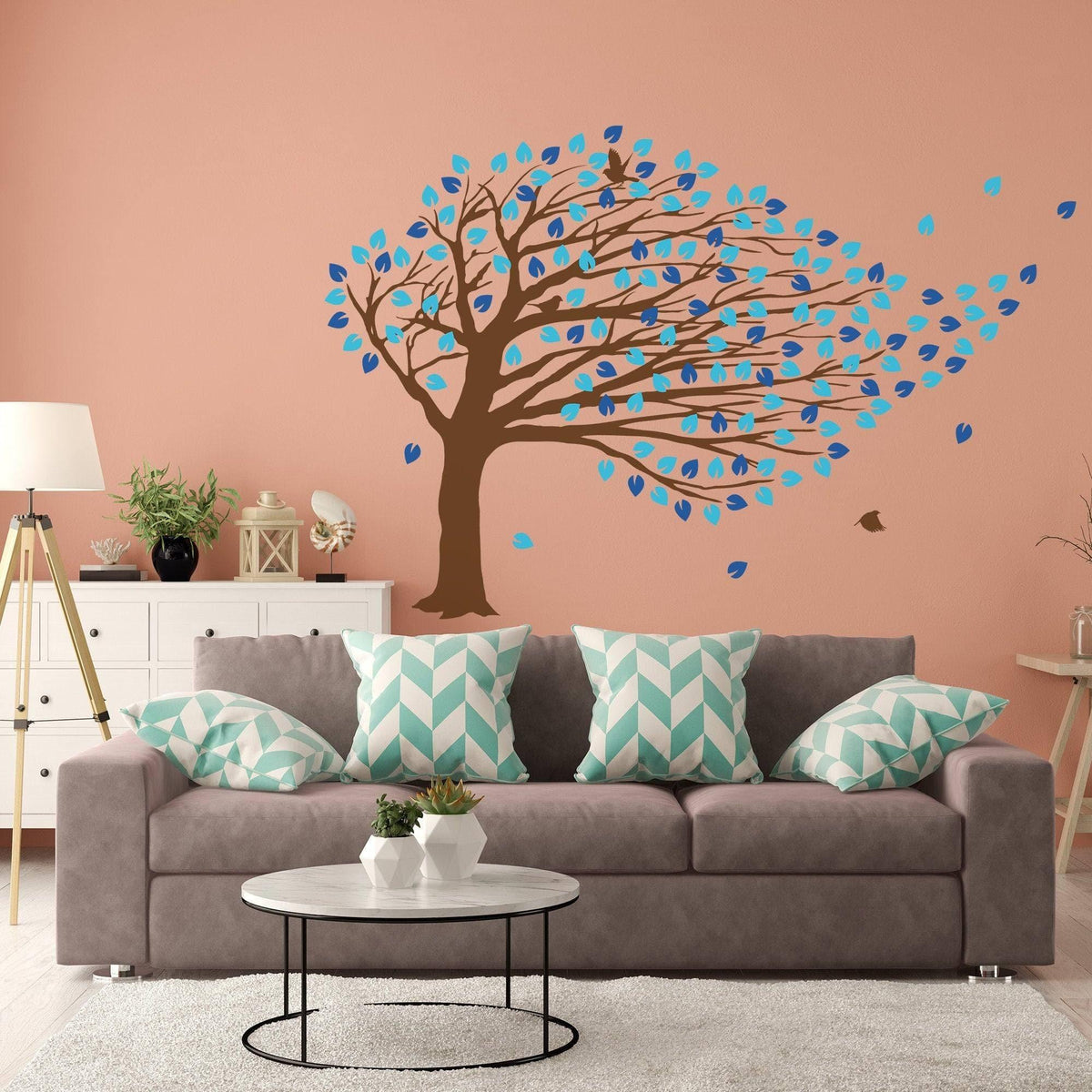 Fantasy tree wall sticker with colorful leaves in a modern living room setting.