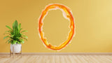 Vibrant orange oval aura wall sticker on a yellow wall.