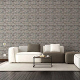 Cozy living room featuring 3D faux stone wall panels with a white couch and modern decor.