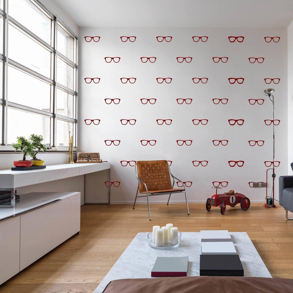 Living room featuring a wall decorated with red spectacles wall decals, showcasing creativity and style.