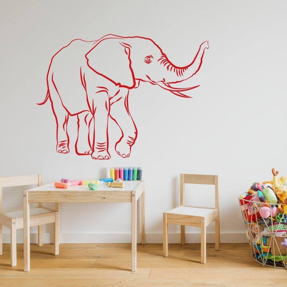 Red elephant vinyl wall decal in a playful children's space with colorful decor.