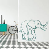 Charming vinyl elephant wall decal in modern living room with stylish decor and checkered flooring.