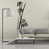 Bamboo wall art decal in a modern living room, adding a tropical touch to the decor.