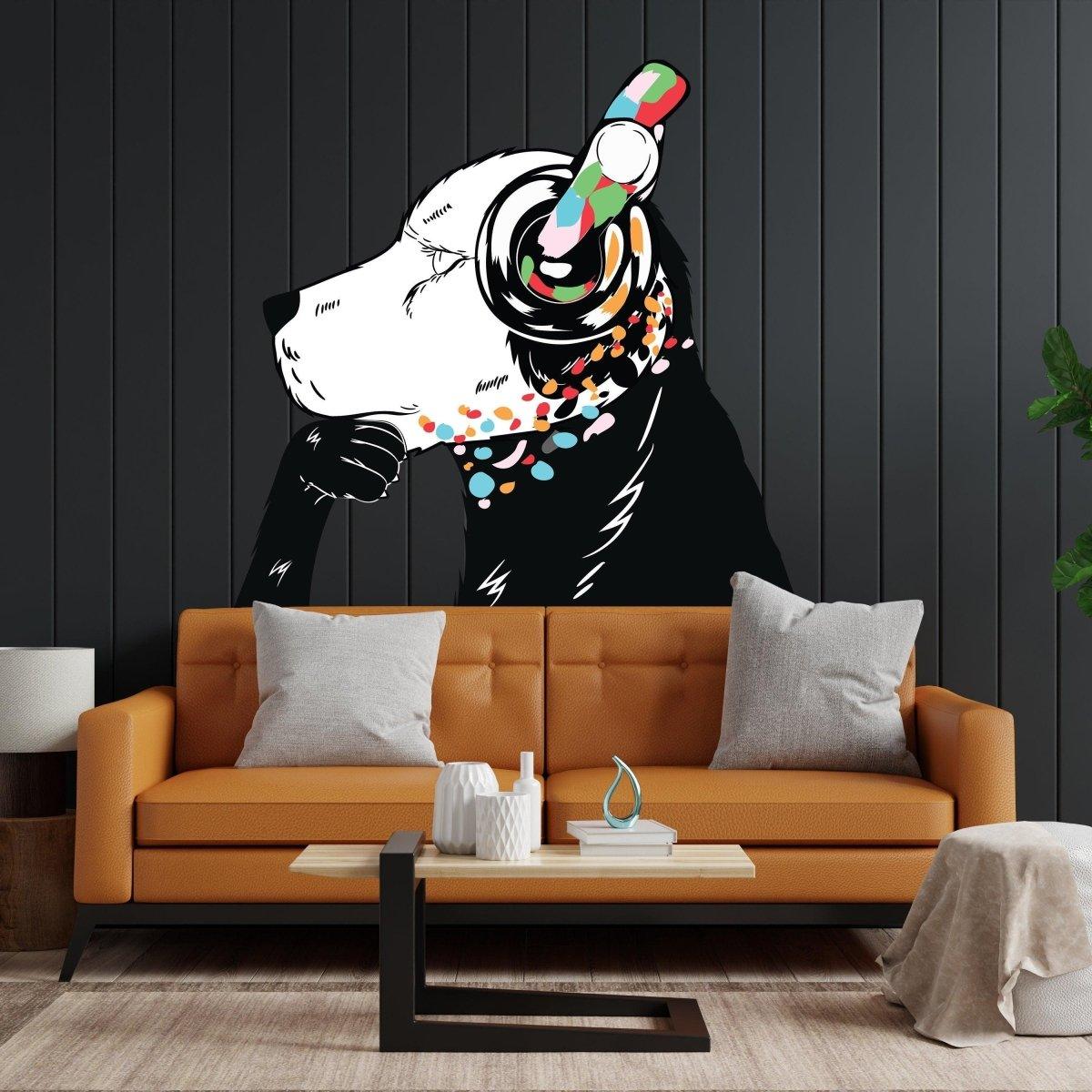 Dog with headphones wall sticker displayed on a black wall above a modern sofa.
