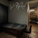 Fun bathroom decor featuring 'Get Naked' wall decal in a stylish, modern bathroom setting.