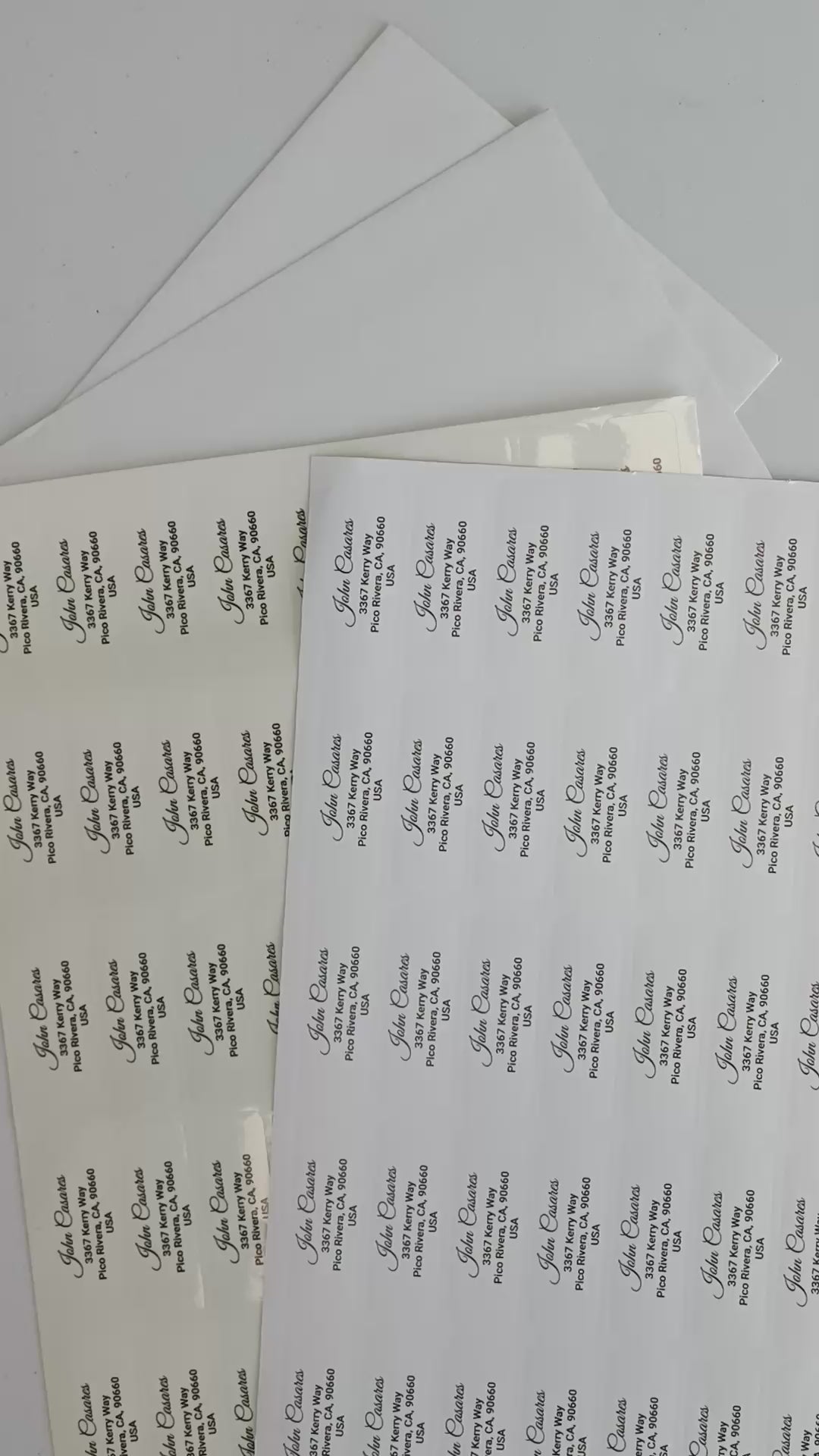 Customized mailing labels featuring personalized address stickers in clear gloss and white matte finishes.