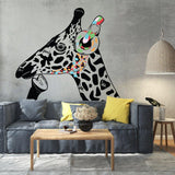 Contemplative giraffe wall sticker in a stylish living room with gray sofa and decorative pillows.