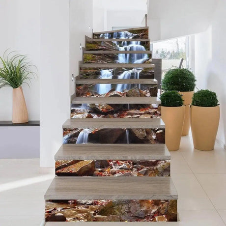 Наклейки с водопадом и камнями на подступёнках лестницы.