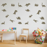 Dinosaur Dreams Wall Sticker Set displayed on a wall above a colorful toy basket and a play table.