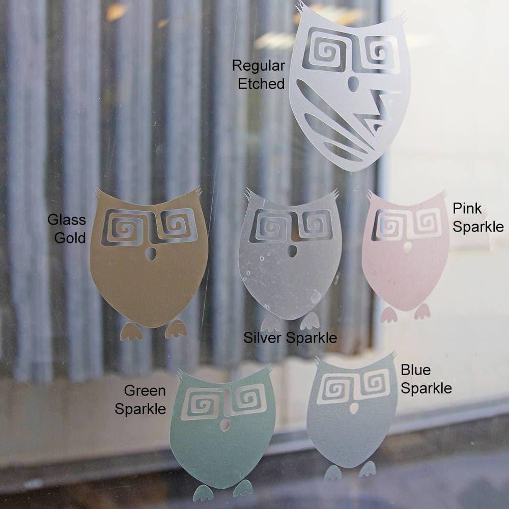 Variety of frosted owl window decals in colors: Glass Gold, Pink Sparkle, Silver Sparkle, Green Sparkle, Blue Sparkle.