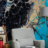 Elegant marble wall covering in a living room, featuring black, blue, and cream tones.