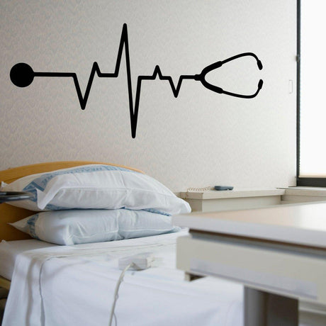 Vinyl decal of a heartbeat line with a stethoscope on a hospital room wall, showcasing healthcare themes.