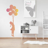 Ethereal Dreams removable wall sticker featuring a girl with balloons.