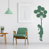 Ethereal Dreams removable wall sticker of a girl with balloons.