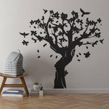 Contemporary tree wall art sticker in black.