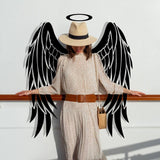 Majestic feather wall sticker featuring angel wings and halo on a woman in a stylish outfit.