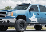 Blue truck with a fun farm animal decal featuring a cow and a chicken on the side.