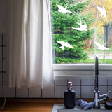 FeatherGuard window decals featuring frosted bird silhouettes for bird-safe homes.
