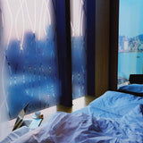 Frosted glass door sticker design in a modern bedroom, providing elegance and privacy while allowing natural light.