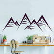 Boho modern vinyl wall decal featuring geometric mountain peaks design in a stylish interior setting.