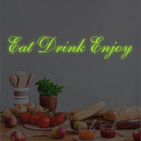 Надпись Eat Drink Enjoy на кухонной стене
