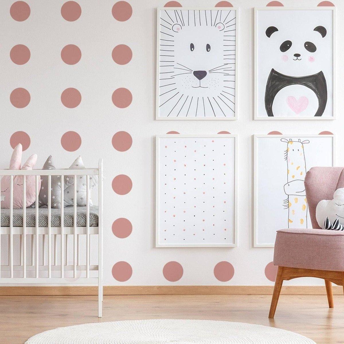 Gold circle wall decals in a stylish nursery featuring animal art.