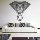 Detailed elephant head wall vinyl sticker above a white sofa, adding Aztec geometric decor to the room.